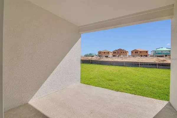 a view of swimming pool outdoor seating and garden