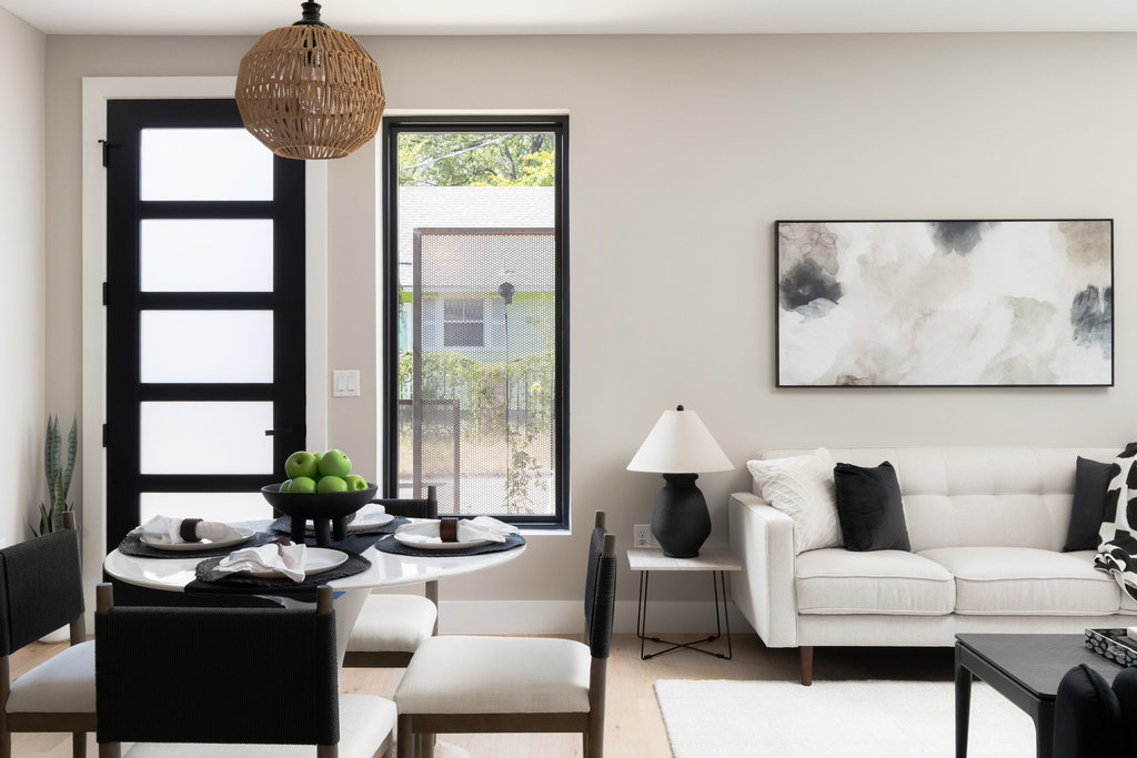 1401 East 3rd Street, Unit 1 Austin, TX 78702 - Photo 13 of 40 Living area featuring wood finished floors and baseboards