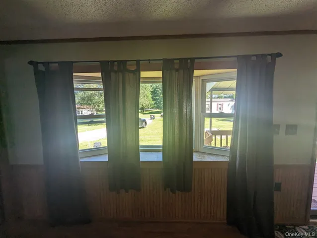 a view of an empty room with window