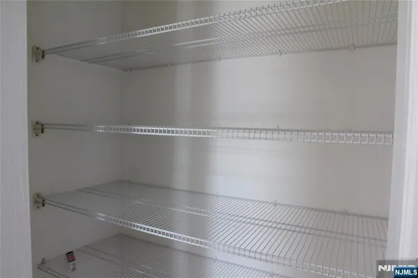 a view of a room with racks on the wall