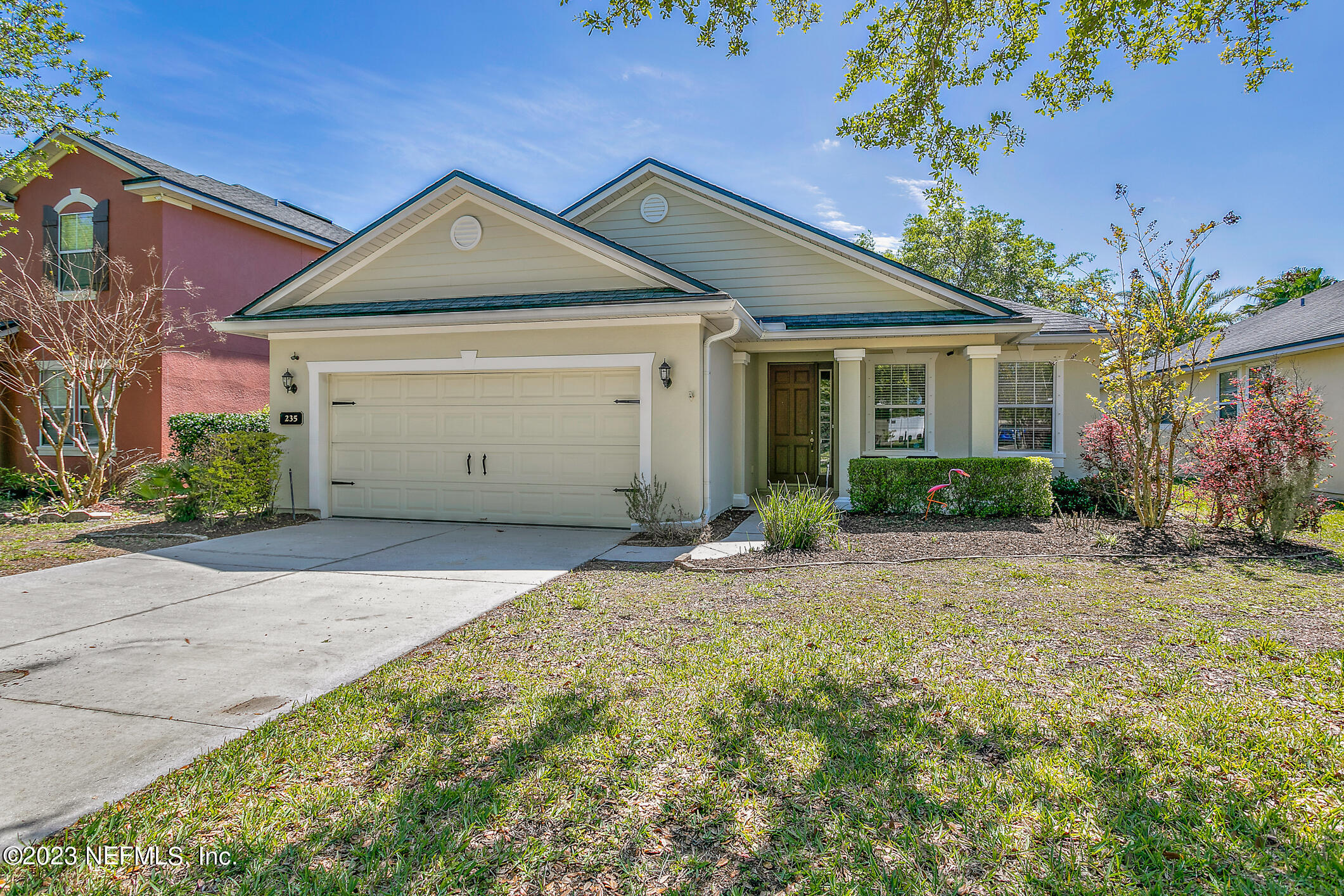 235 Pine Arbor Circle St. Augustine, FL 32084 - Photo 1 of 41 front view of a house with a yard