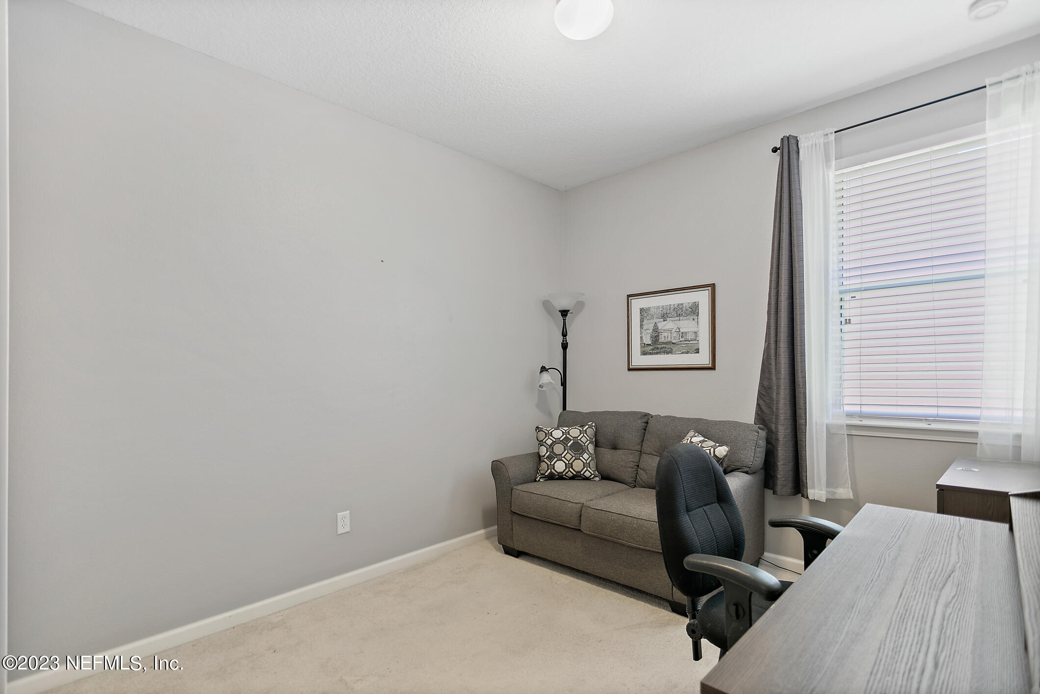235 Pine Arbor Circle St. Augustine, FL 32084 - Photo 11 of 41 a living room with furniture and a window