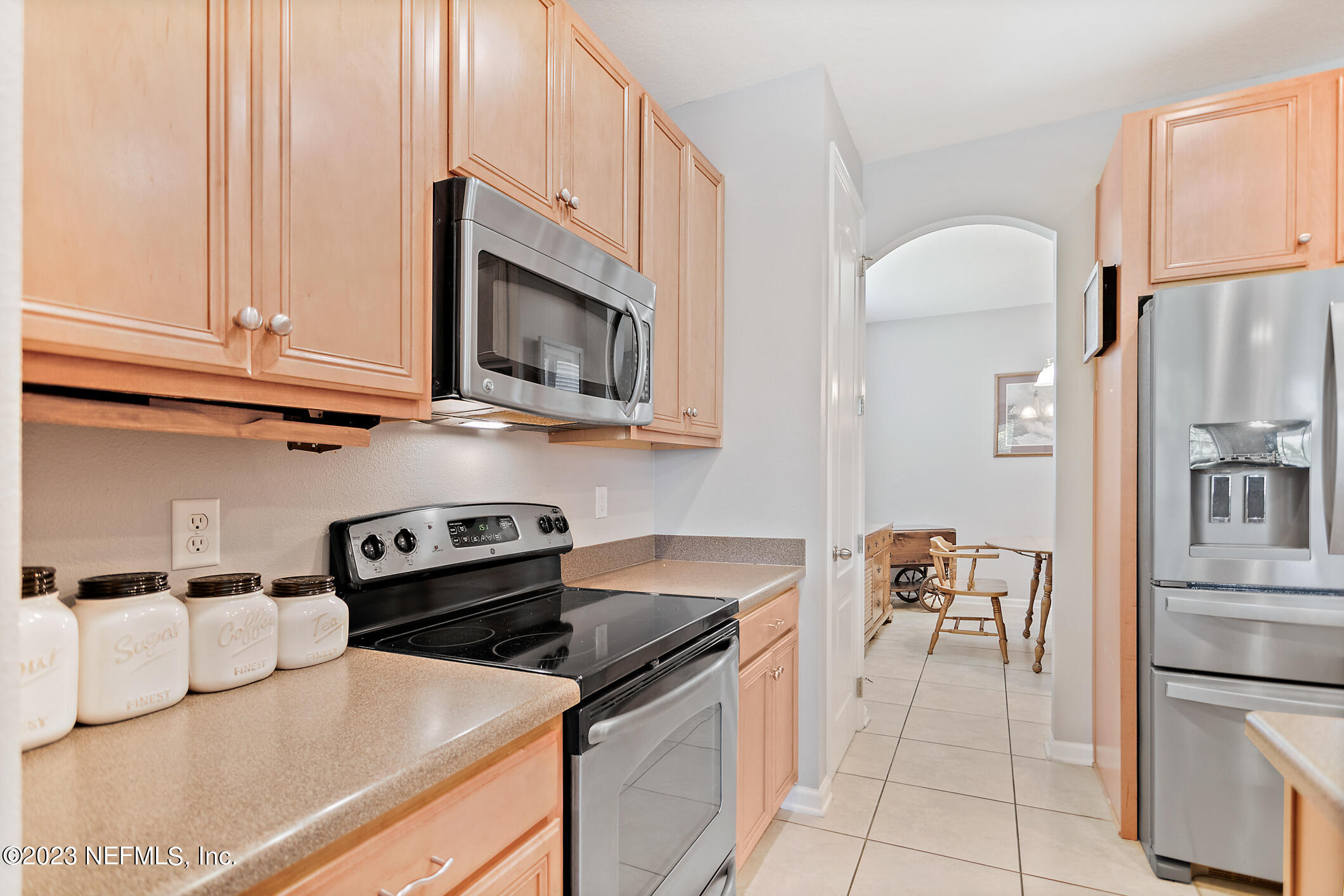 235 Pine Arbor Circle St. Augustine, FL 32084 - Photo 20 of 41 a kitchen with stainless steel appliances granite countertop a refrigerator sink and stove