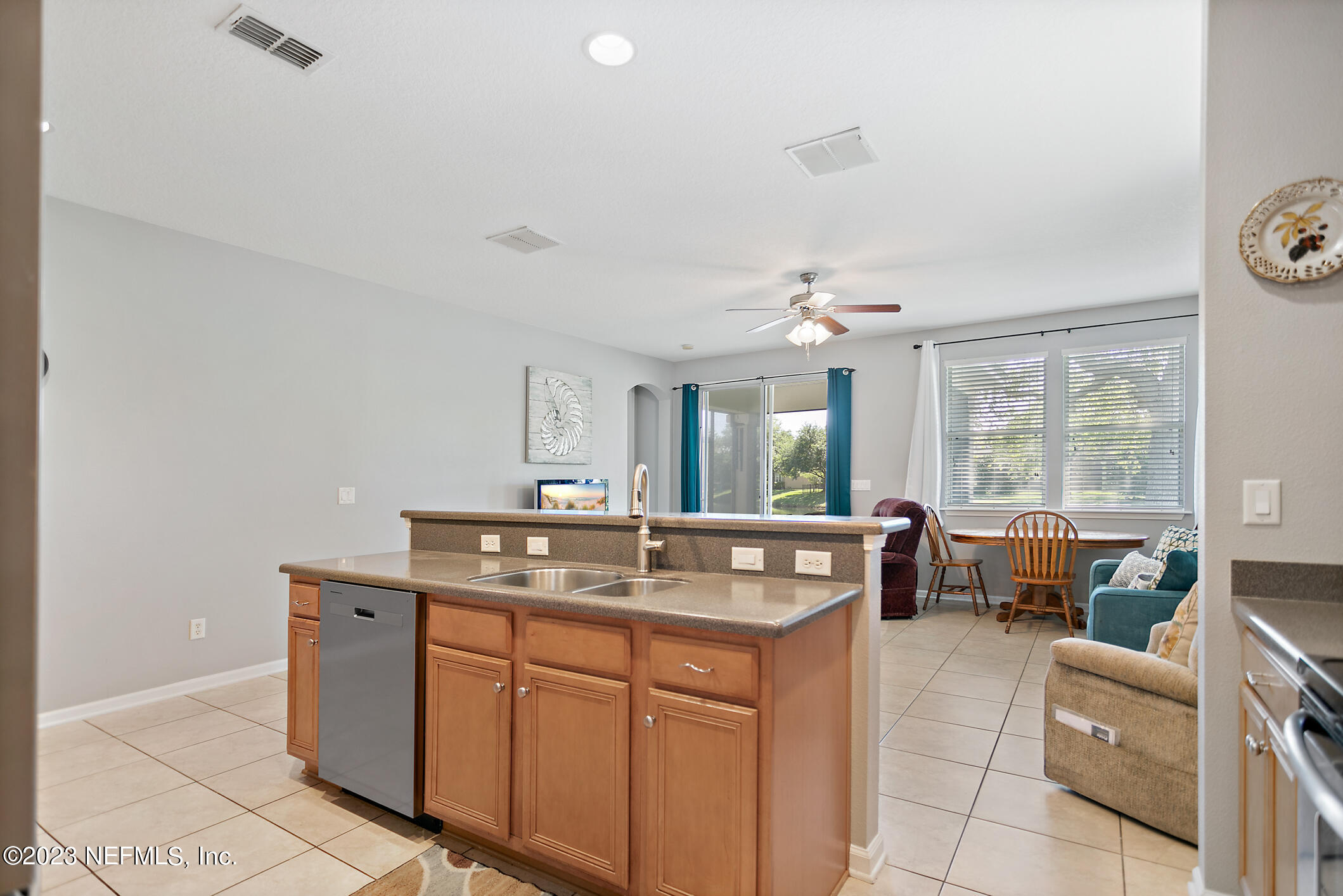 235 Pine Arbor Circle St. Augustine, FL 32084 - Photo 21 of 41 a kitchen with a sink stove and cabinets