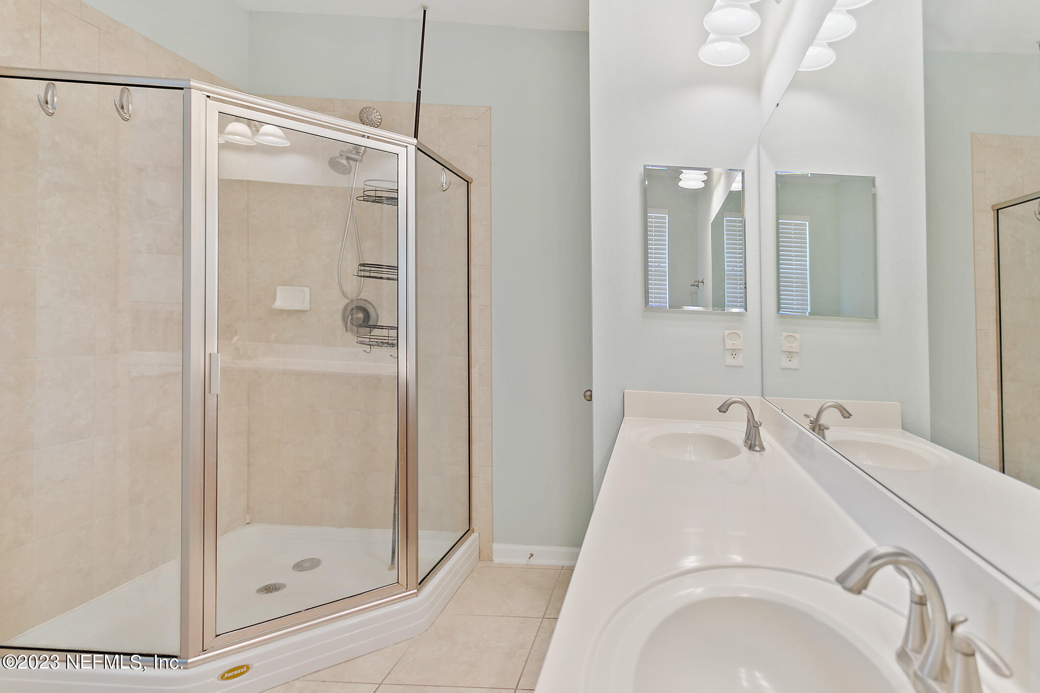 235 Pine Arbor Circle St. Augustine, FL 32084 - Photo 31 of 41 a bathroom with a tub and shower
