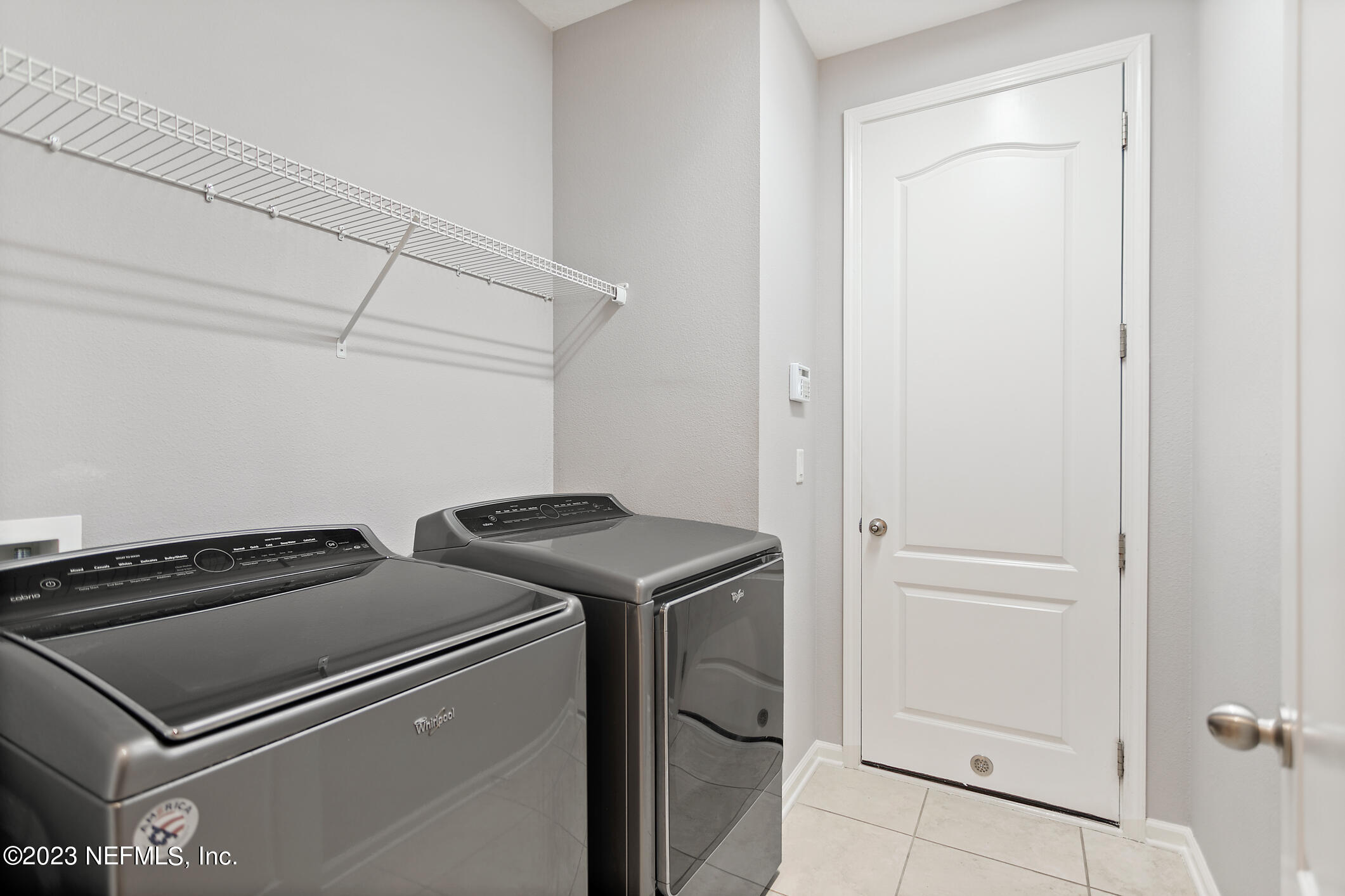 235 Pine Arbor Circle St. Augustine, FL 32084 - Photo 32 of 41 a utility room with dryer and washer