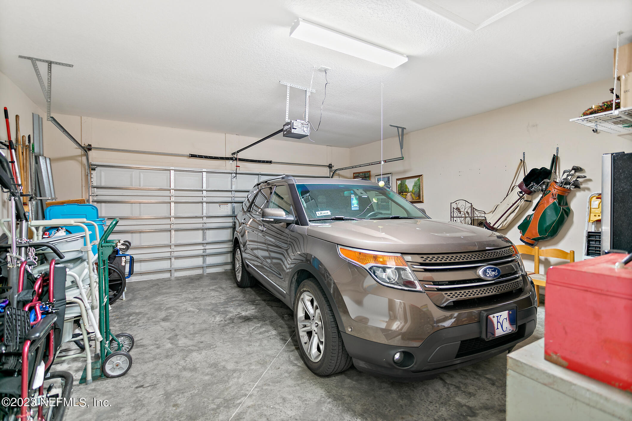 235 Pine Arbor Circle St. Augustine, FL 32084 - Photo 33 of 41 a utility room with dryer and bicycles