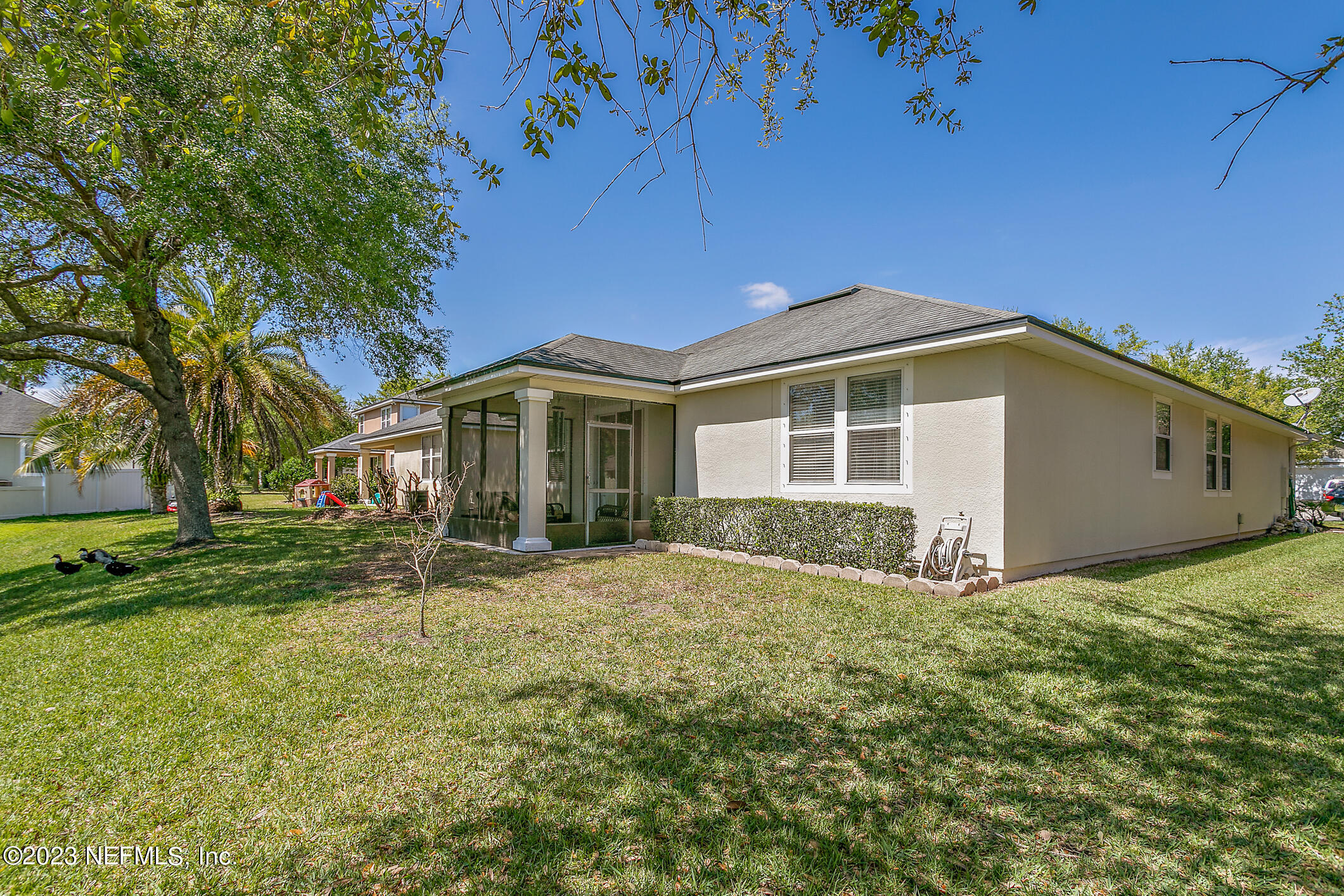 235 Pine Arbor Circle St. Augustine, FL 32084 - Photo 40 of 41 a front view of a house with a yard