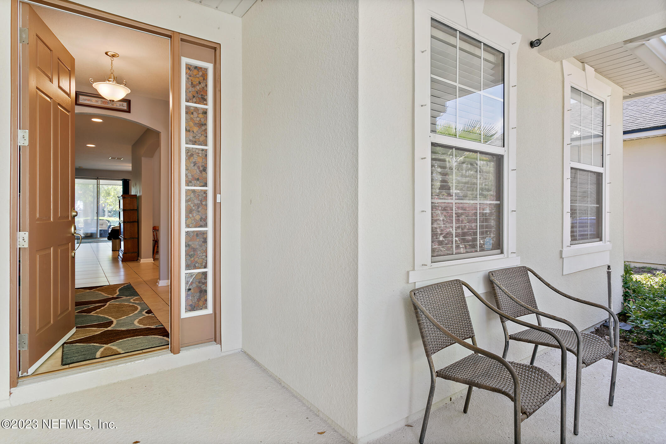 235 Pine Arbor Circle St. Augustine, FL 32084 - Photo 4 of 41 a view of an entryway with wooden floor