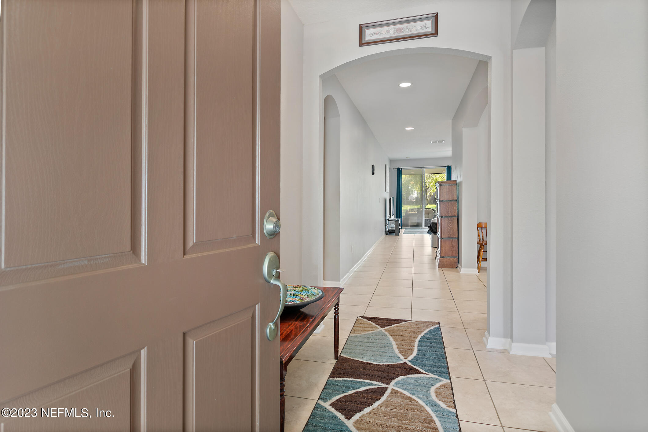 235 Pine Arbor Circle St. Augustine, FL 32084 - Photo 5 of 41 hallway with wooden floor