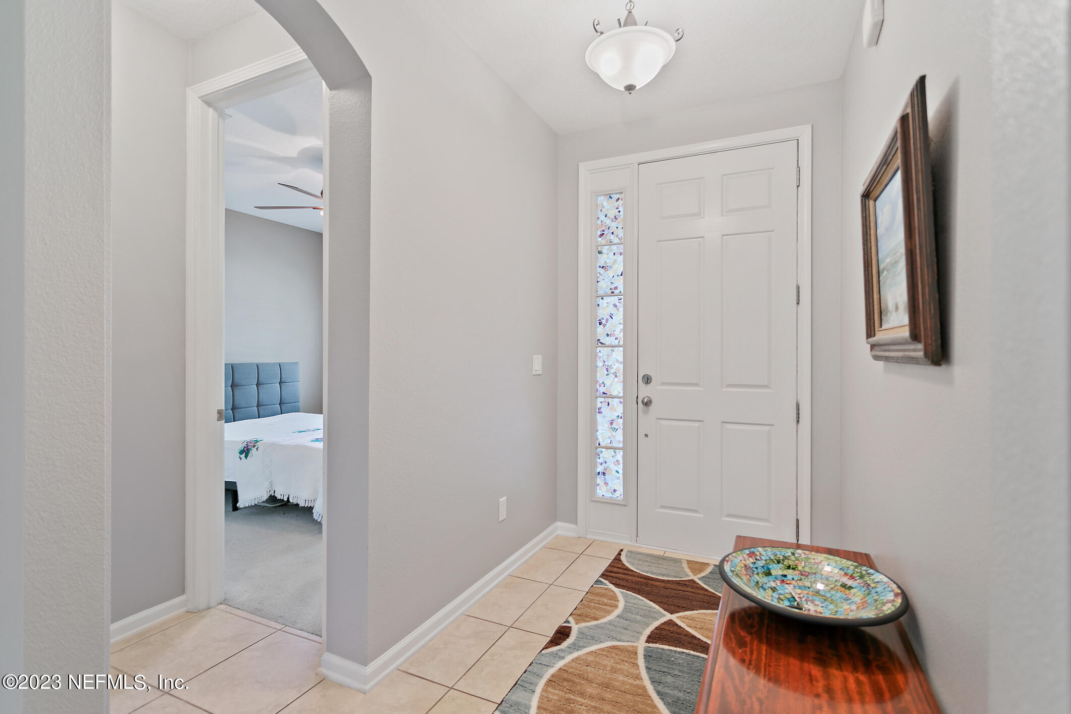235 Pine Arbor Circle St. Augustine, FL 32084 - Photo 6 of 41 a living room with furniture and a table