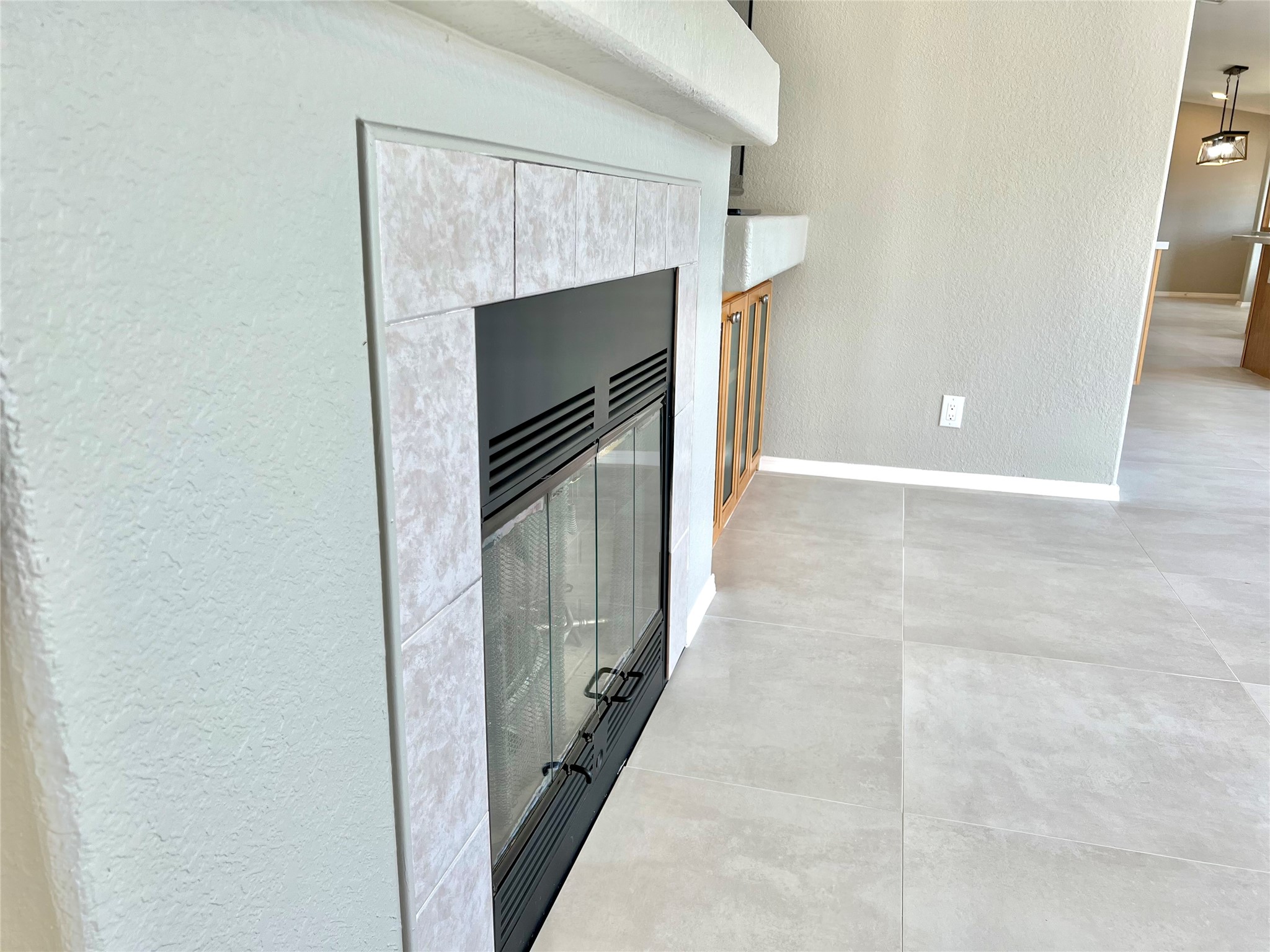 14505 Alice Road, Unit A Tomball, TX 77377 - Photo 12 of 28 a view of an empty room with a fireplace