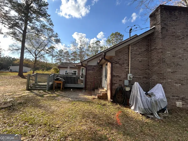 a view of a house with a patio