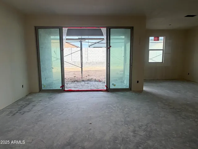 an empty room with windows