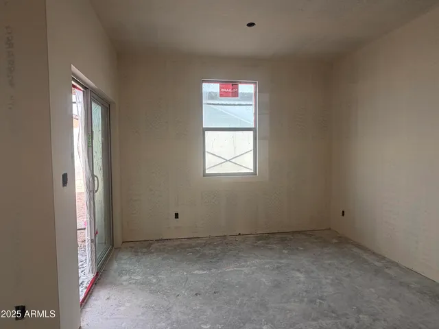 an empty room with windows