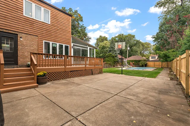 a view of a house with swimming pool