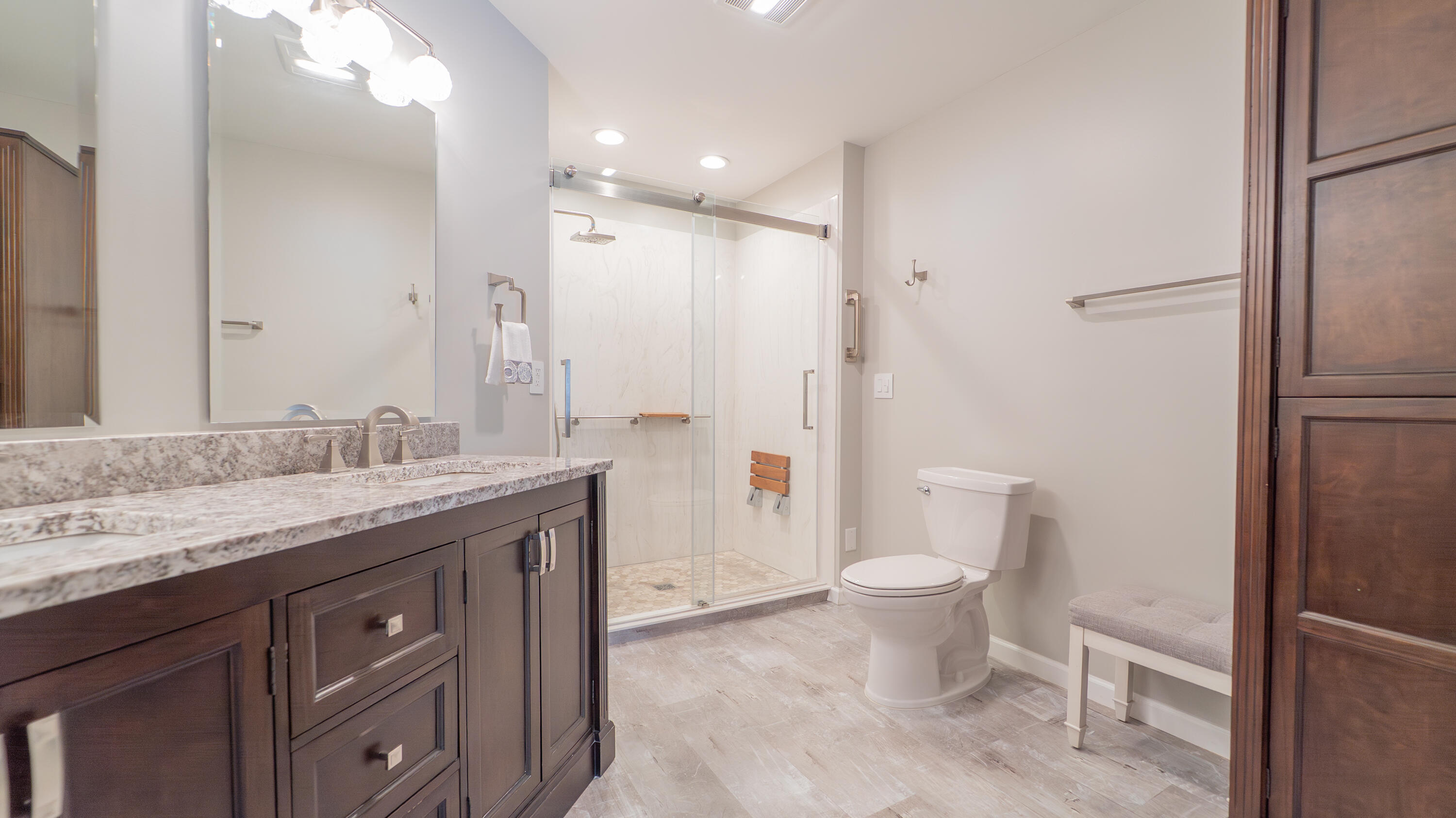 9427 Van Buren Street Crown Point, IN 46307 - Photo 24 of 46 a bathroom with a granite countertop sink toilet and shower