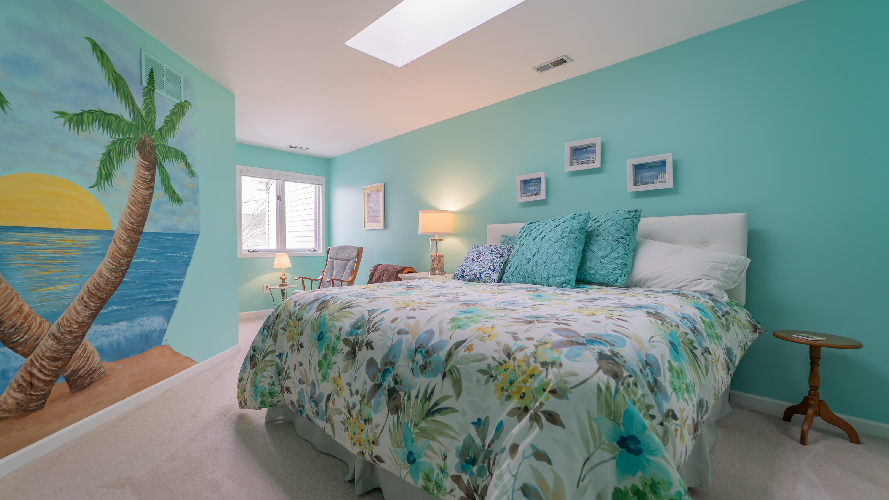 9427 Van Buren Street Crown Point, IN 46307 - Photo 32 of 46 a spacious bedroom with a bed and a potted plant