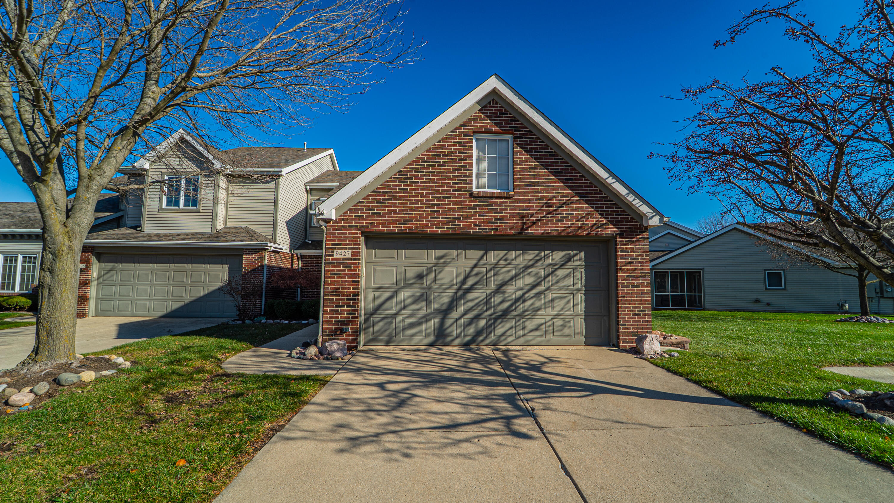 9427 Van Buren Street Crown Point, IN 46307 - Photo 41 of 46 a front view of a house with a yard