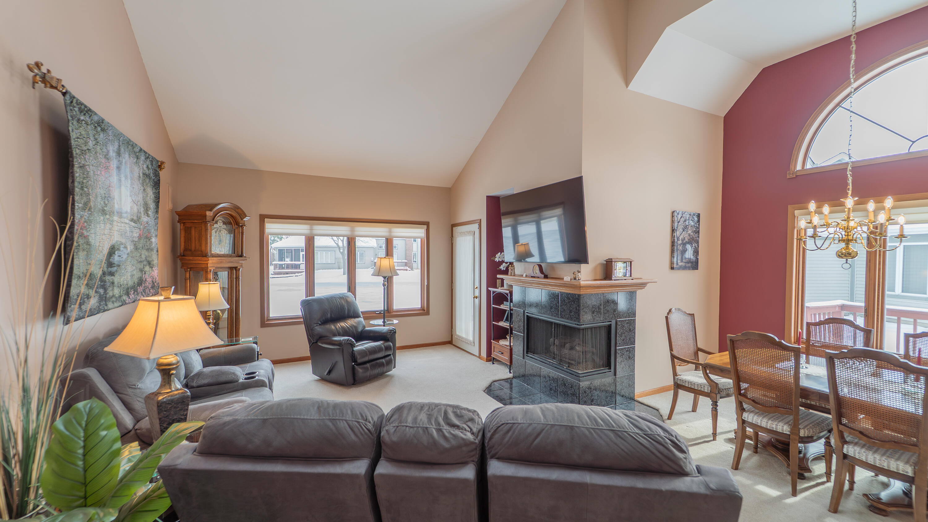 9427 Van Buren Street Crown Point, IN 46307 - Photo 6 of 46 a living room with furniture and a fireplace