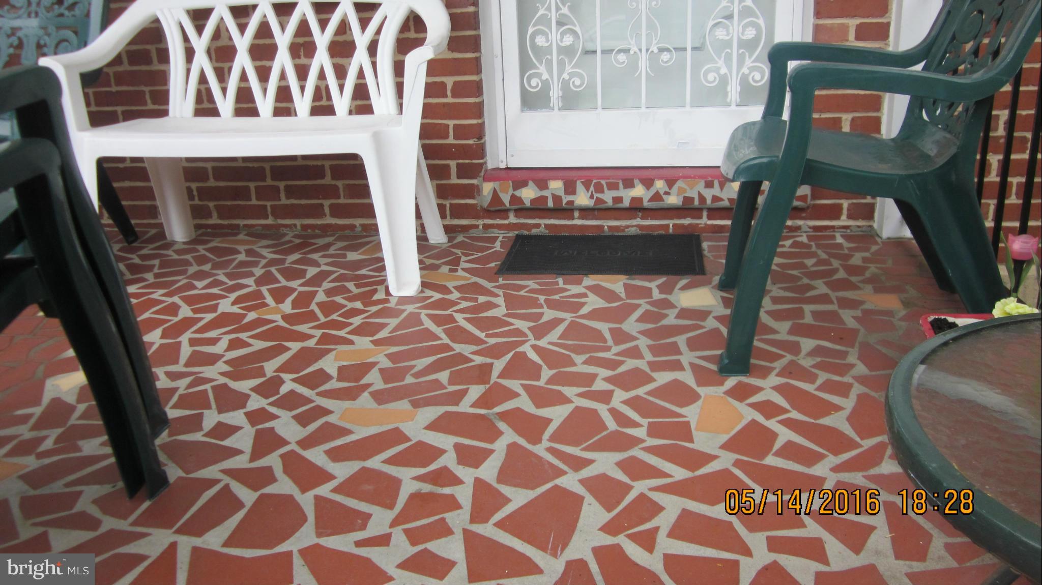 1334 Stonewood Road Baltimore, MD 21239 - Photo 3 of 18 a front view of a house