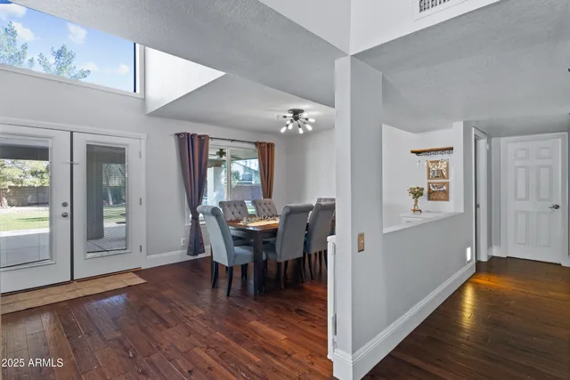 a view of entryway with wooden floor