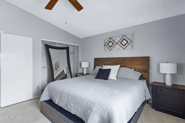 a view of a bedroom with a workspace