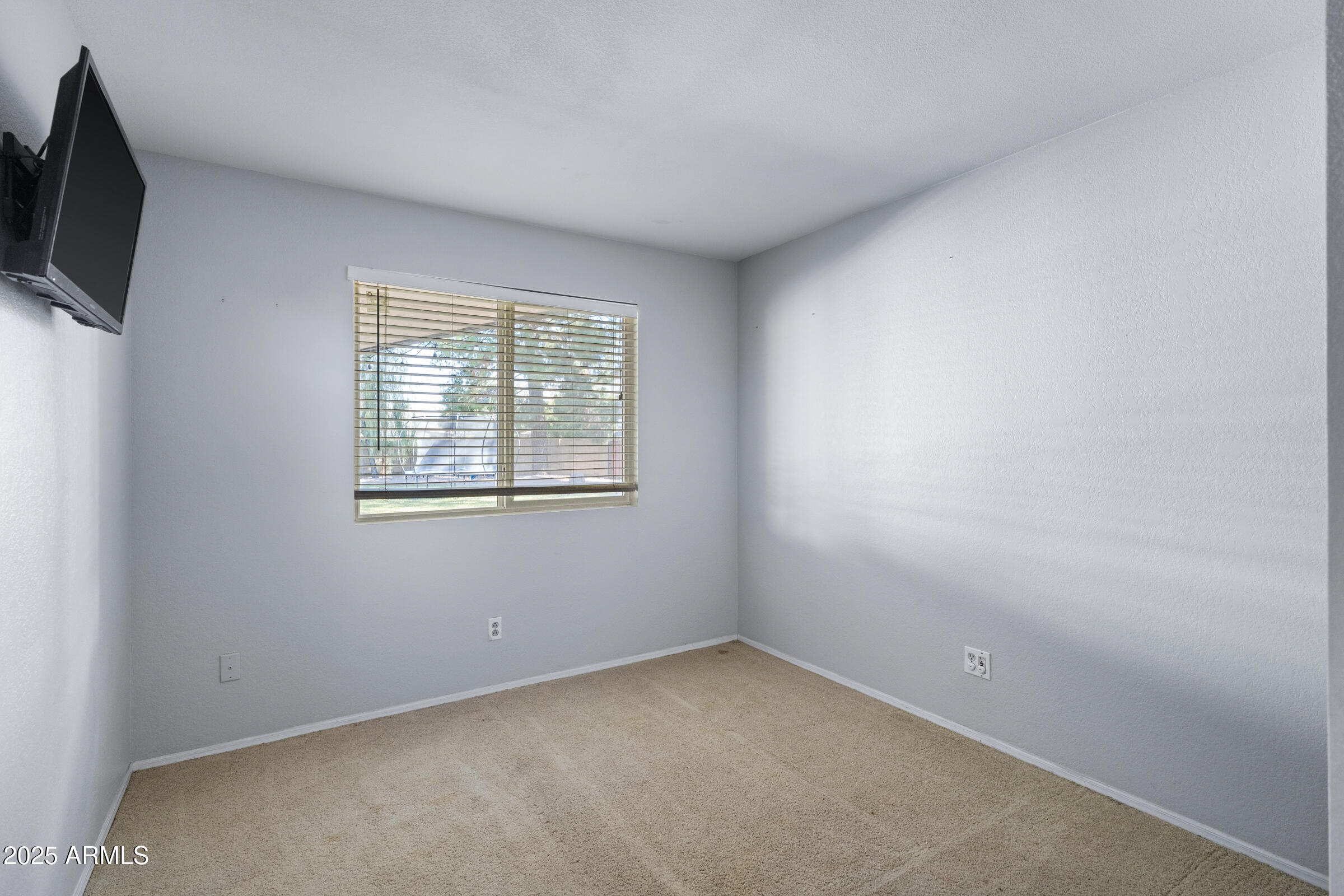 1645 North Saguaro Street Chandler, AZ 85224 - Photo 44 of 45 an empty room with windows
