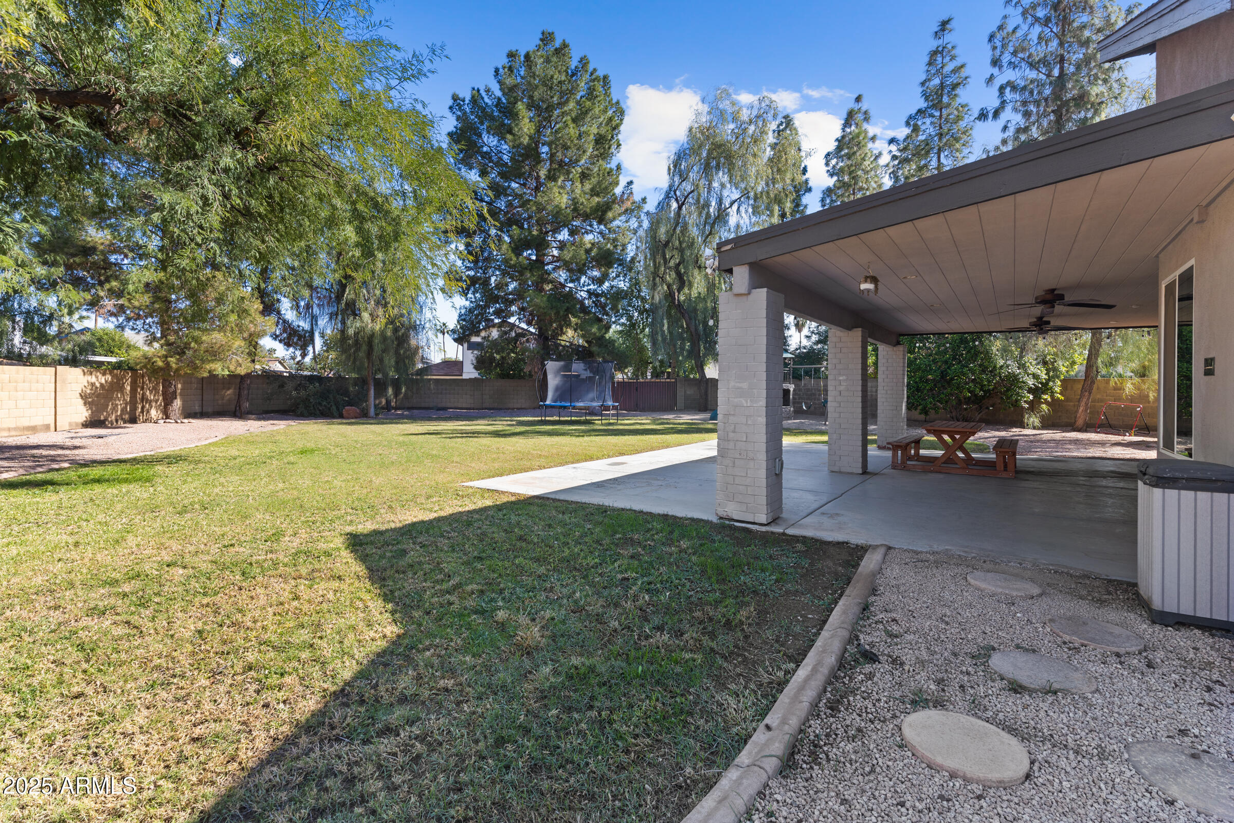 1645 North Saguaro Street Chandler, AZ 85224 - Photo 10 of 45 a view of a swimming pool with a patio