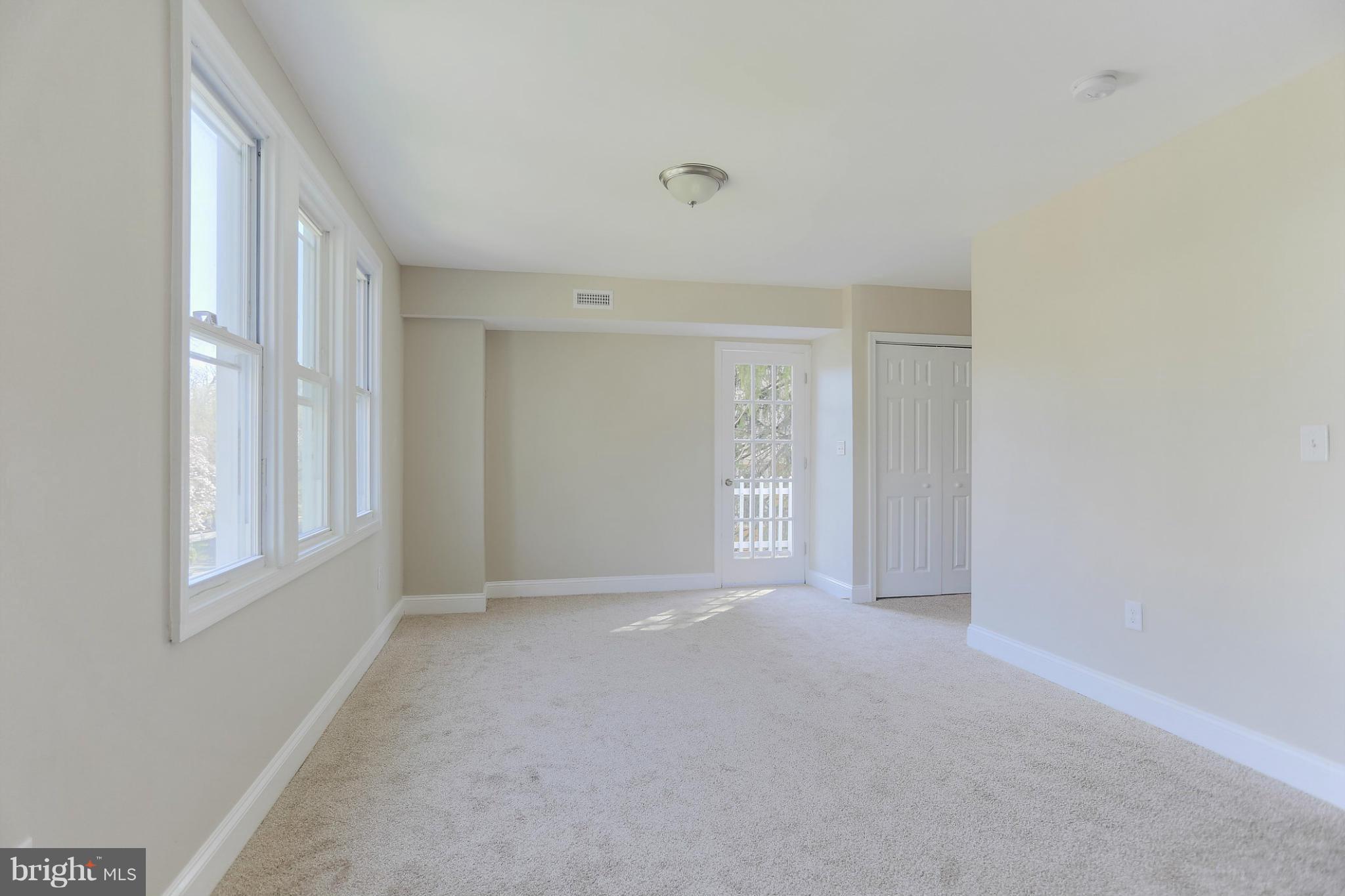 2304 Monticello Road Baltimore, MD 21216 - Photo 17 of 30 a view of an empty room with a window