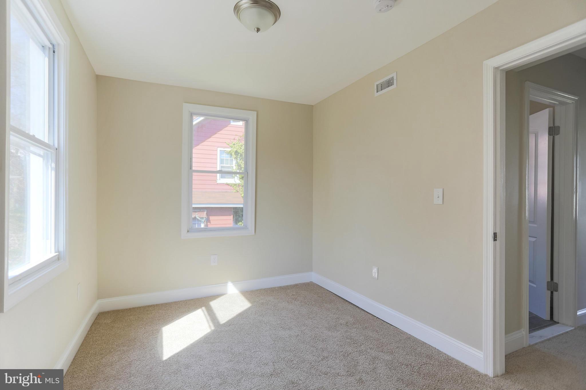 2304 Monticello Road Baltimore, MD 21216 - Photo 23 of 30 an empty room with a window