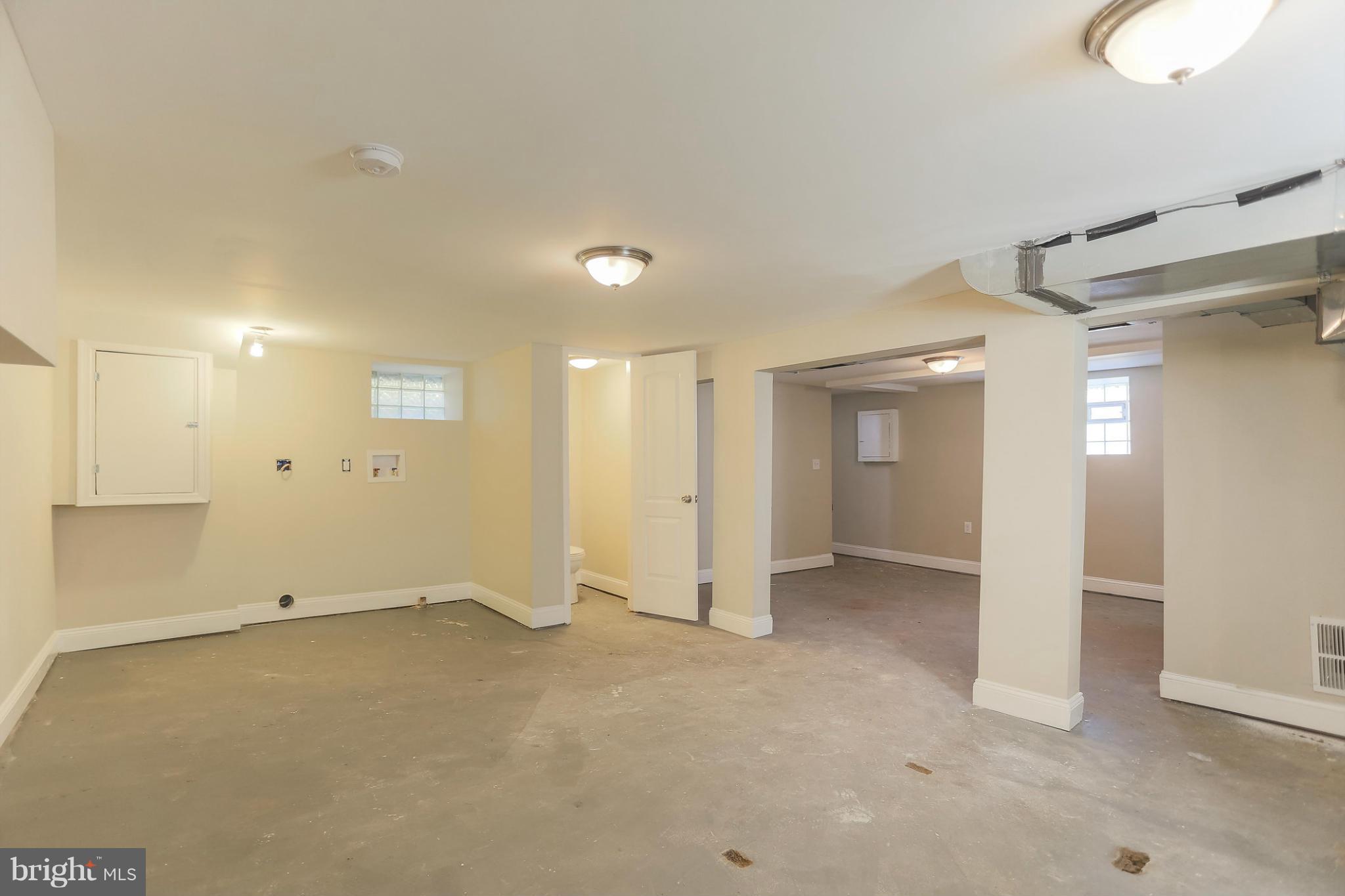 2304 Monticello Road Baltimore, MD 21216 - Photo 27 of 30 an empty room with closet and windows