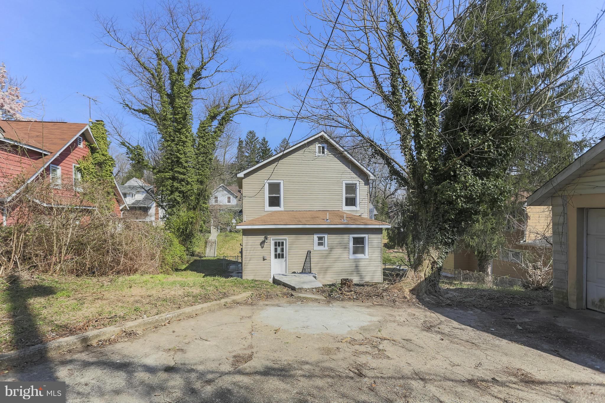 2304 Monticello Road Baltimore, MD 21216 - Photo 30 of 30 a view of a house with a yard and tree