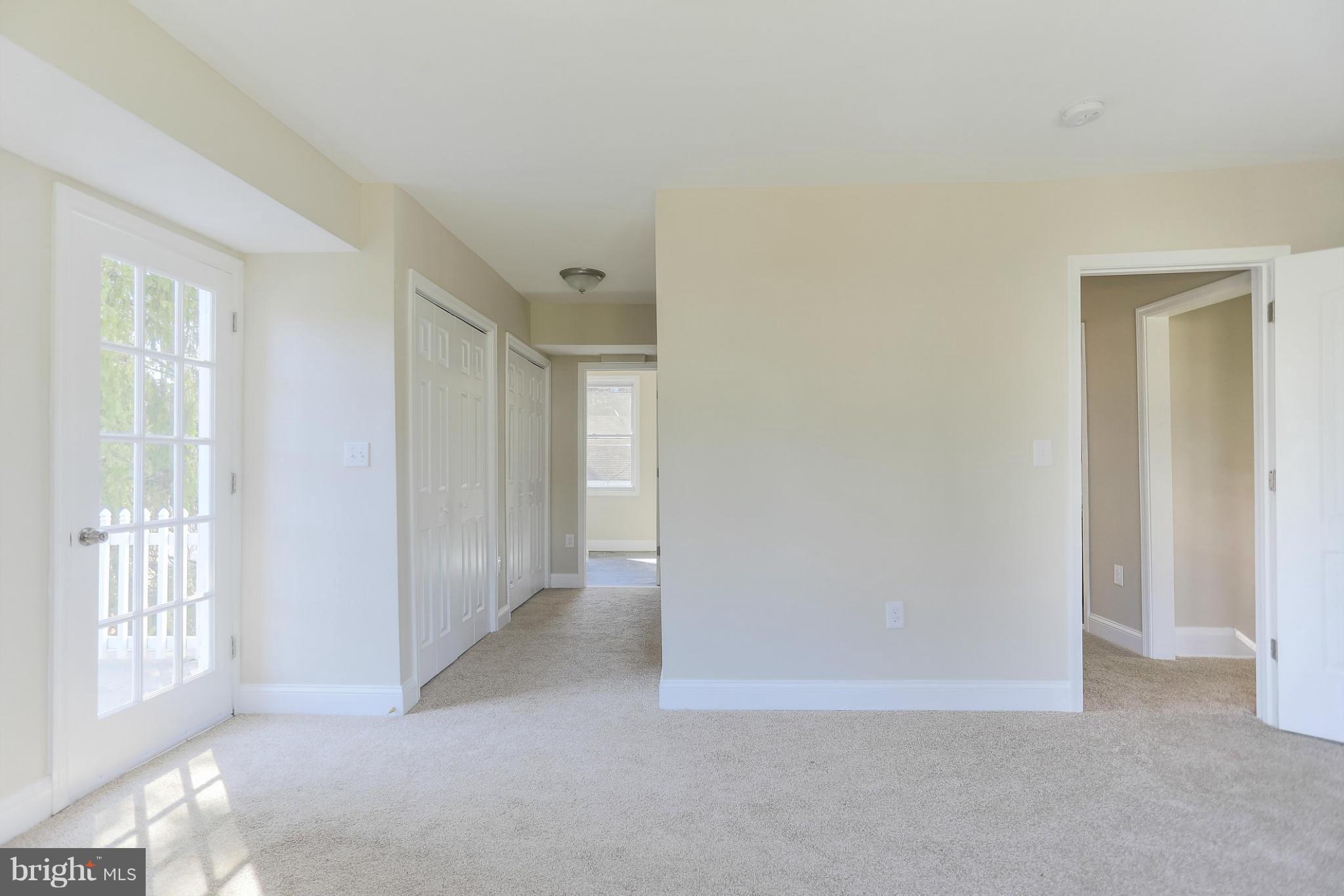 2304 Monticello Road Baltimore, MD 21216 - Photo 4 of 30 a view of an empty room with windows