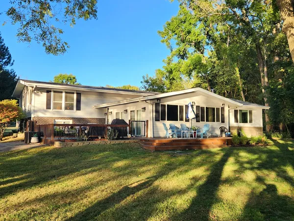 a view of a house with a big yard
