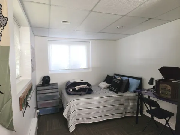 a room with furniture and a window