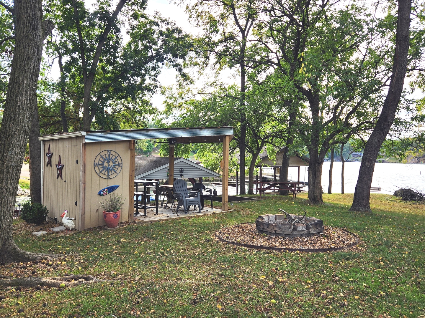 152 Beachview Court Varna, IL 61375 - Photo 24 of 49 a view of a wooden house with a yard