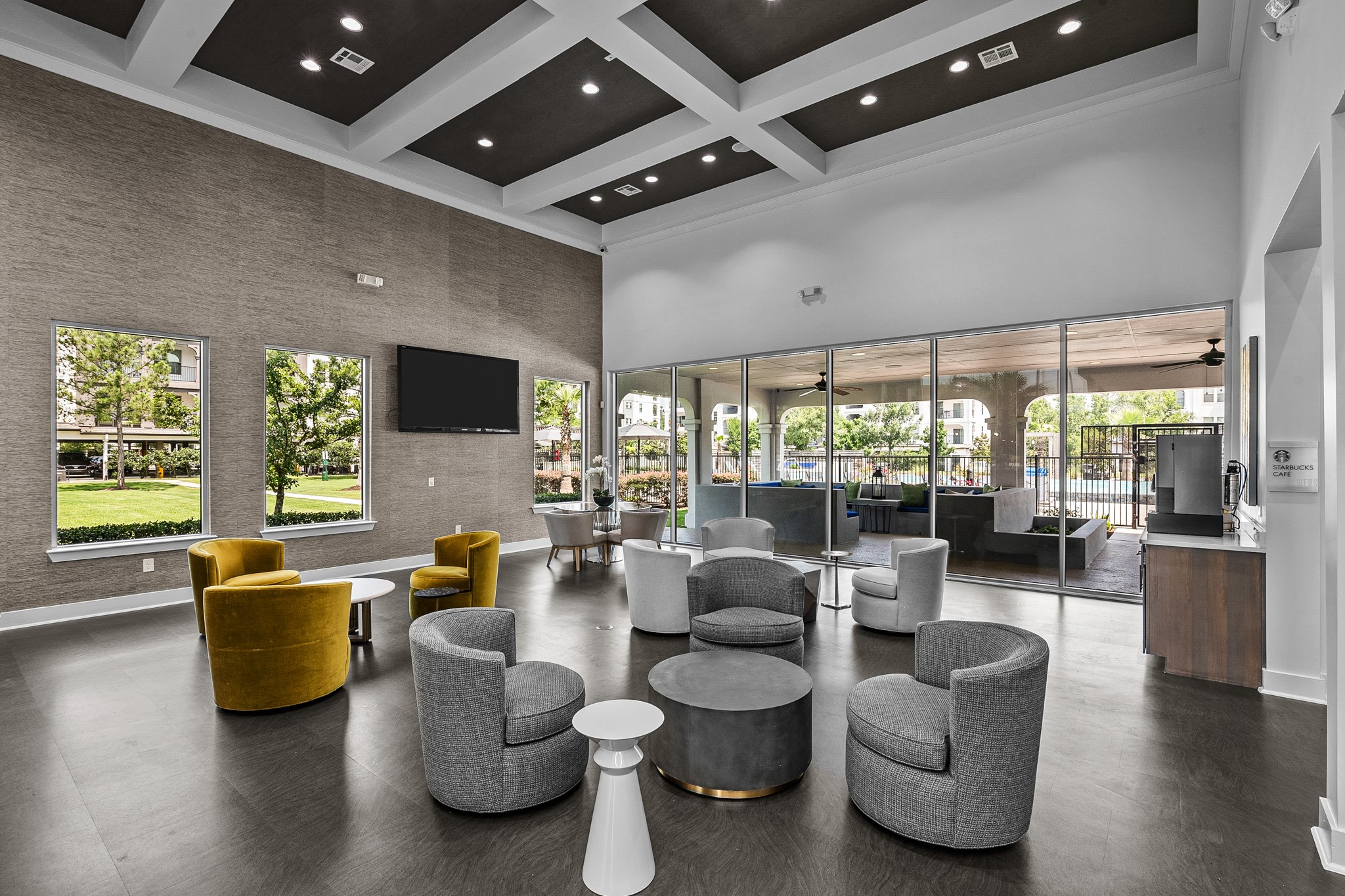 366 Fm 1488 Road, Unit 1042 Conroe, TX 77384 - Photo 27 of 38 a living room with furniture and a large window