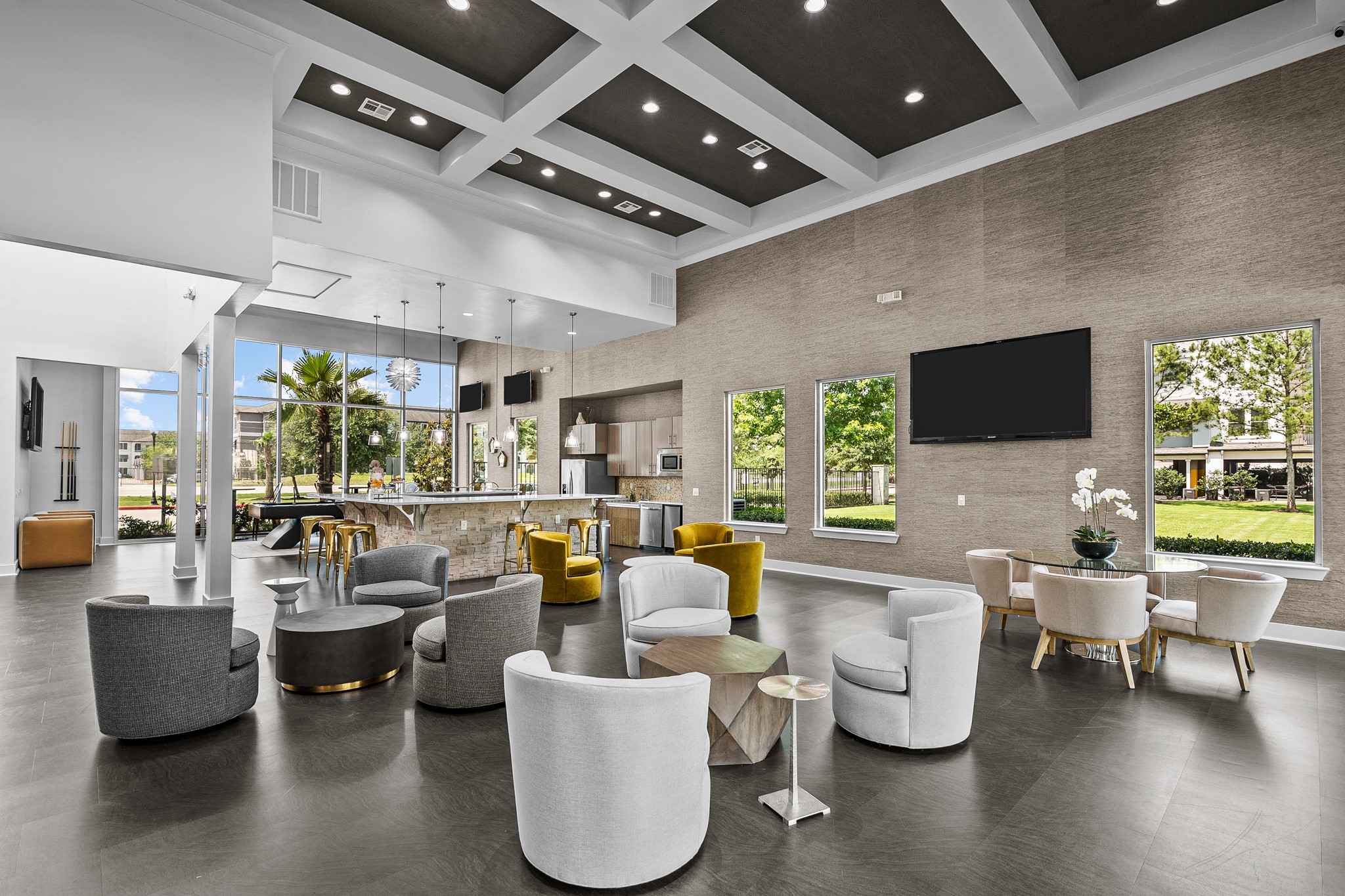 366 Fm 1488 Road, Unit 1042 Conroe, TX 77384 - Photo 28 of 38 a living room with patio furniture and a flat screen tv