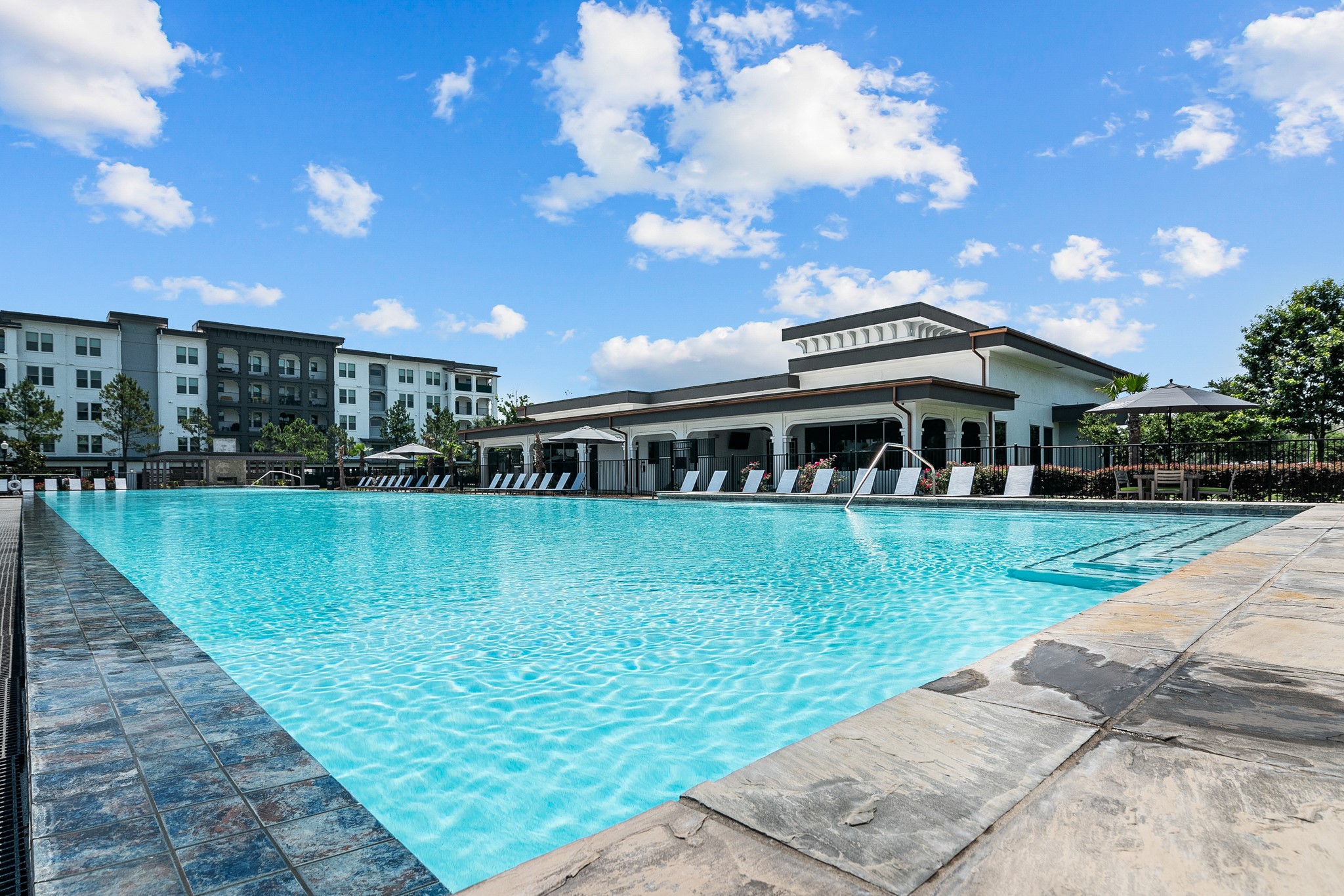366 Fm 1488 Road, Unit 1042 Conroe, TX 77384 - Photo 33 of 38 a view of a house with a yard