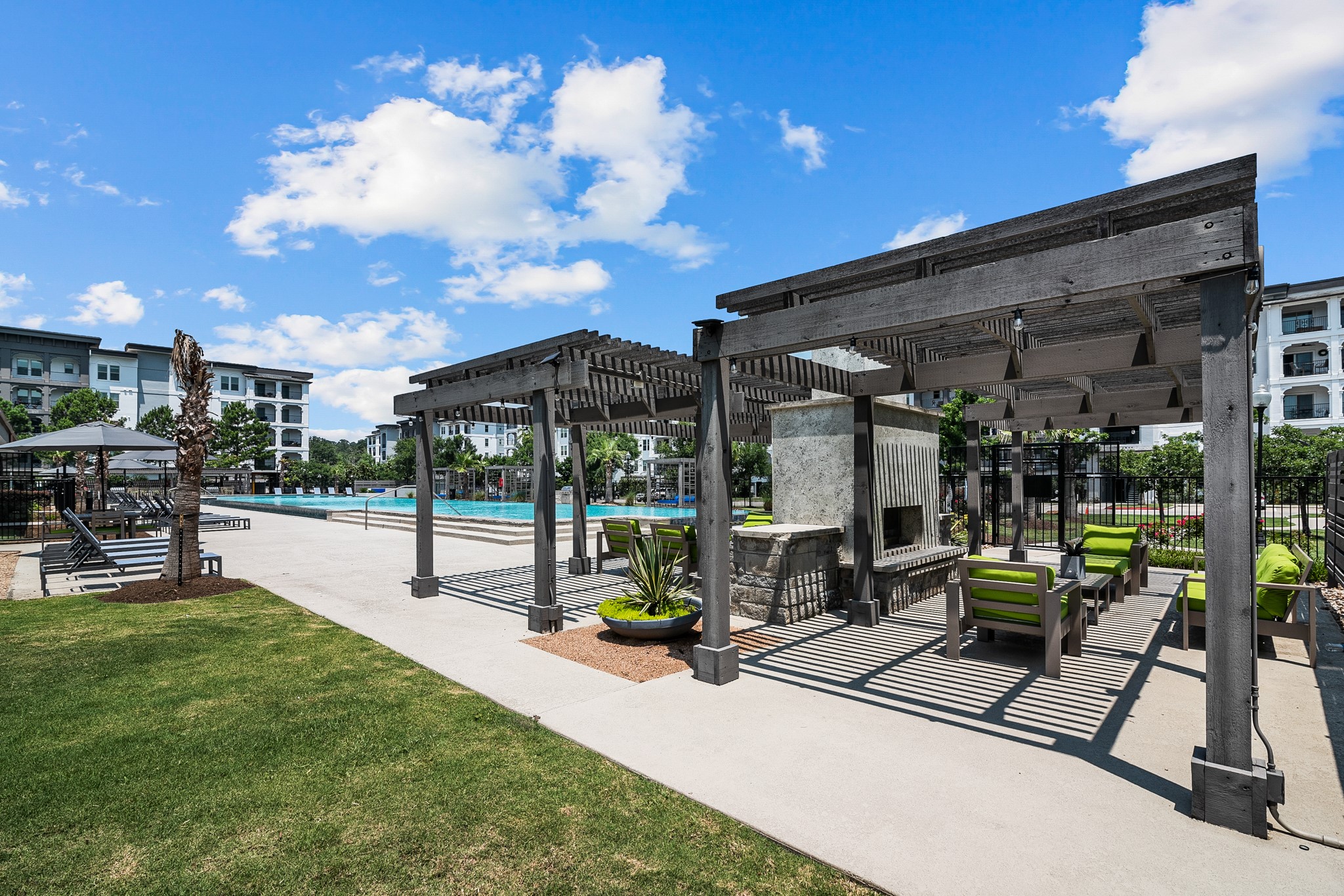 366 Fm 1488 Road, Unit 1042 Conroe, TX 77384 - Photo 34 of 38 a view of a backyard with sitting area