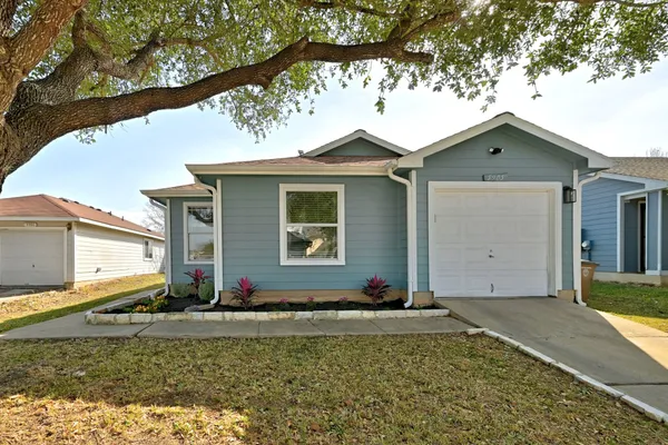 a front view of house with yard