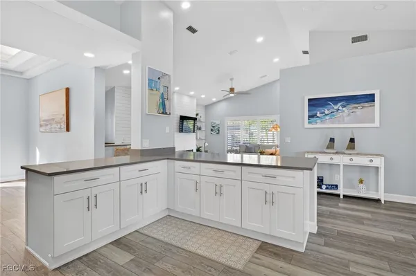 a large kitchen with cabinets