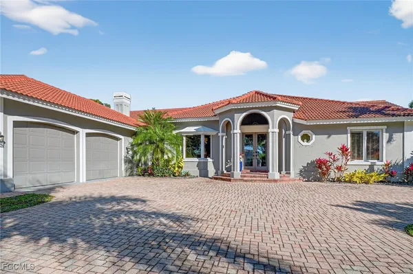 a front view of a house with a porch