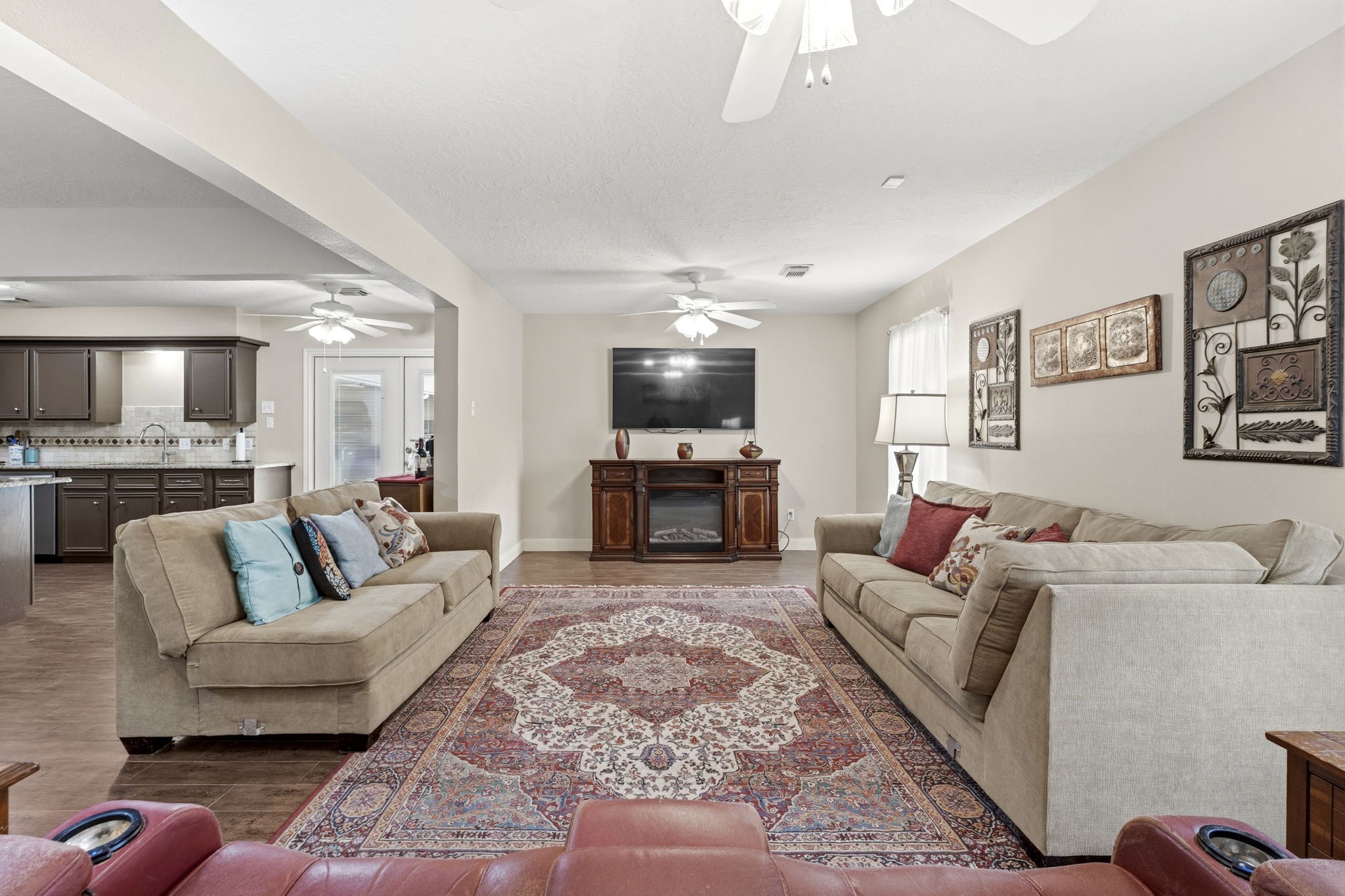 21809 Tophill Drive Spring, TX 77388 - Photo 9 of 50 a living room with furniture and a view of kitchen