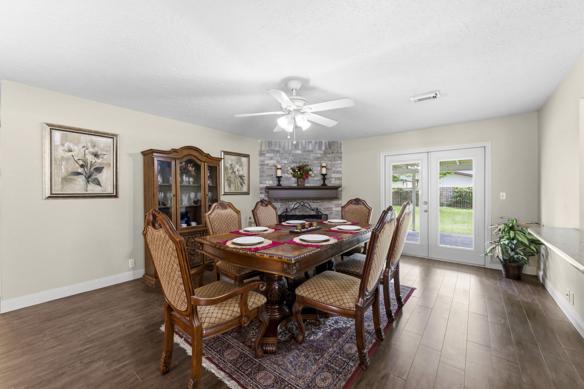 21809 Tophill Drive Spring, TX 77388 - Photo 10 of 50 a view of a dining room with furniture window and wooden floor