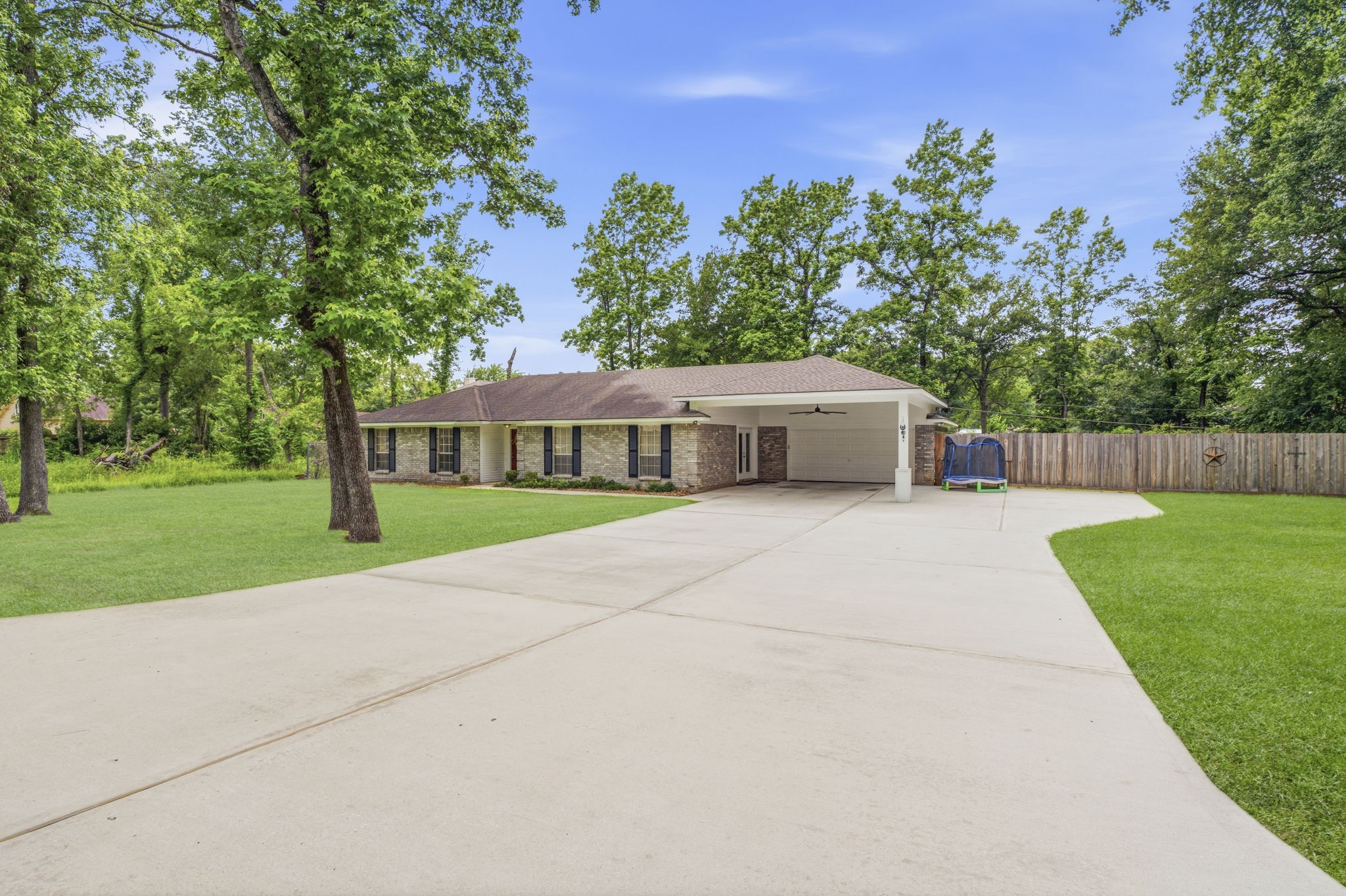 21809 Tophill Drive Spring, TX 77388 - Photo 2 of 50 a front view of a house with yard