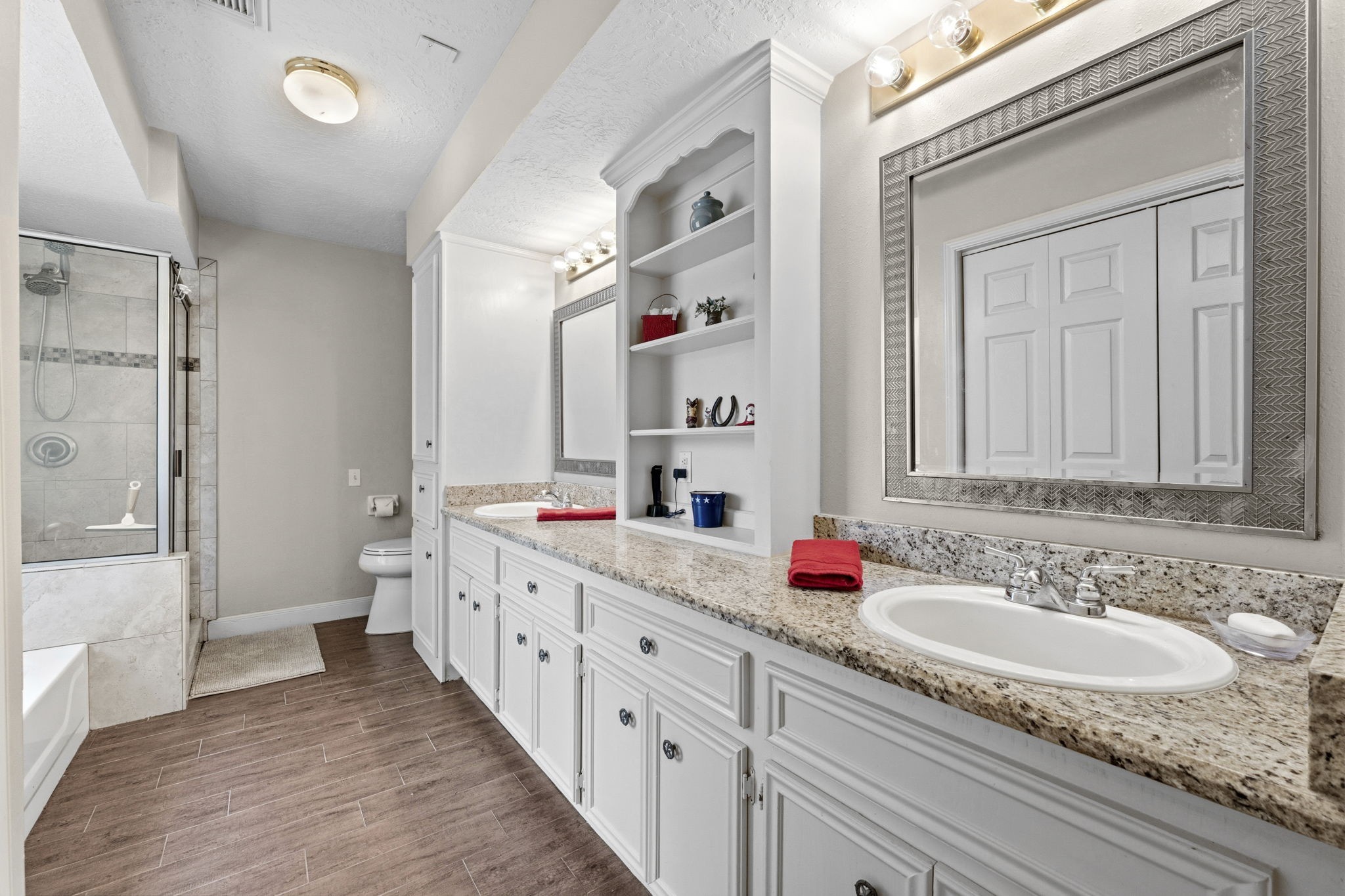 21809 Tophill Drive Spring, TX 77388 - Photo 19 of 50 a bathroom with a granite countertop double vanity sink mirror and double