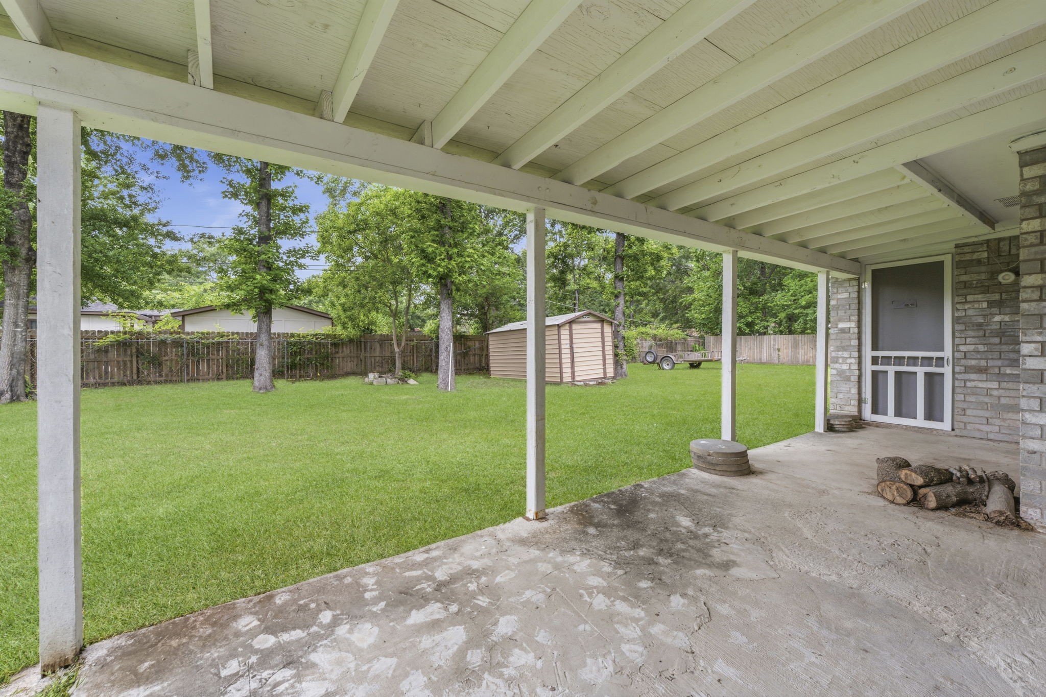 21809 Tophill Drive Spring, TX 77388 - Photo 31 of 50 a view of a porch with a backyard