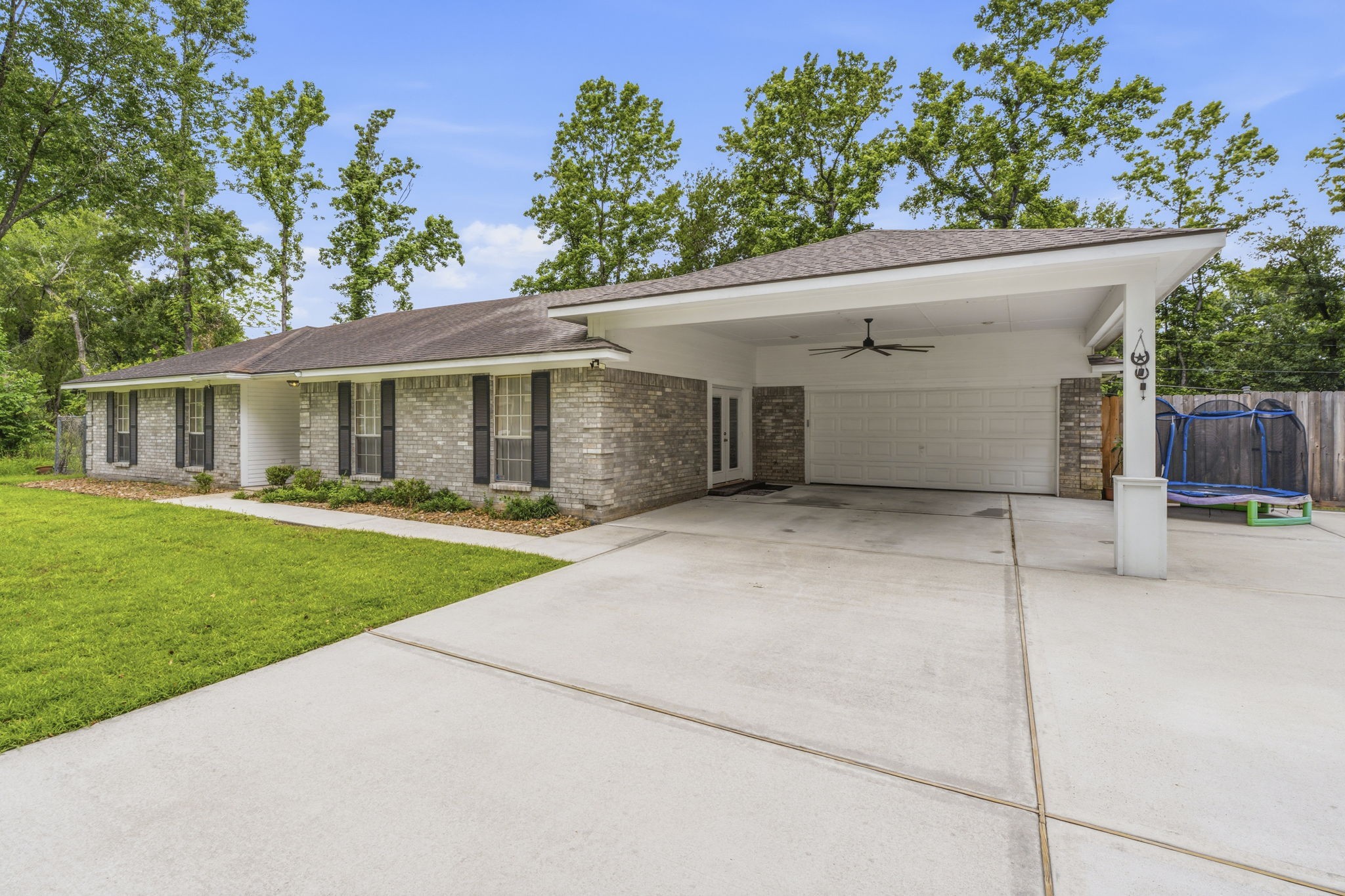 21809 Tophill Drive Spring, TX 77388 - Photo 33 of 50 a view of a house with a yard and potted plants